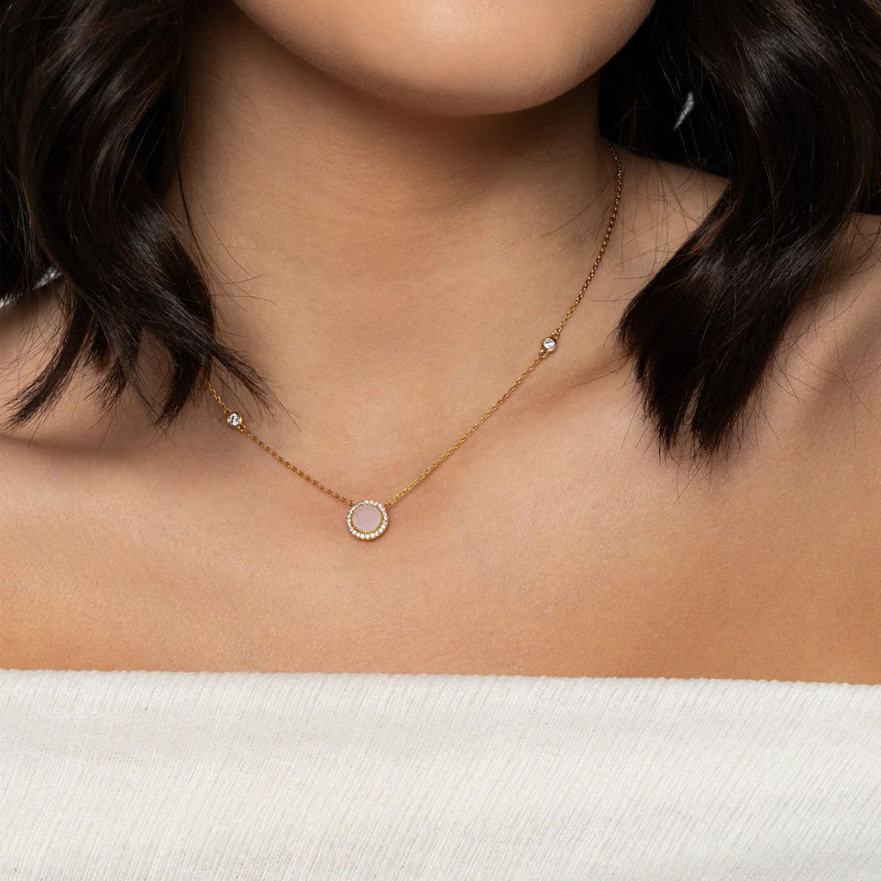 Miniature rose water opal stone embellished with tiny CZ stones. 18K gold plating. Length 16" + 2" extension.