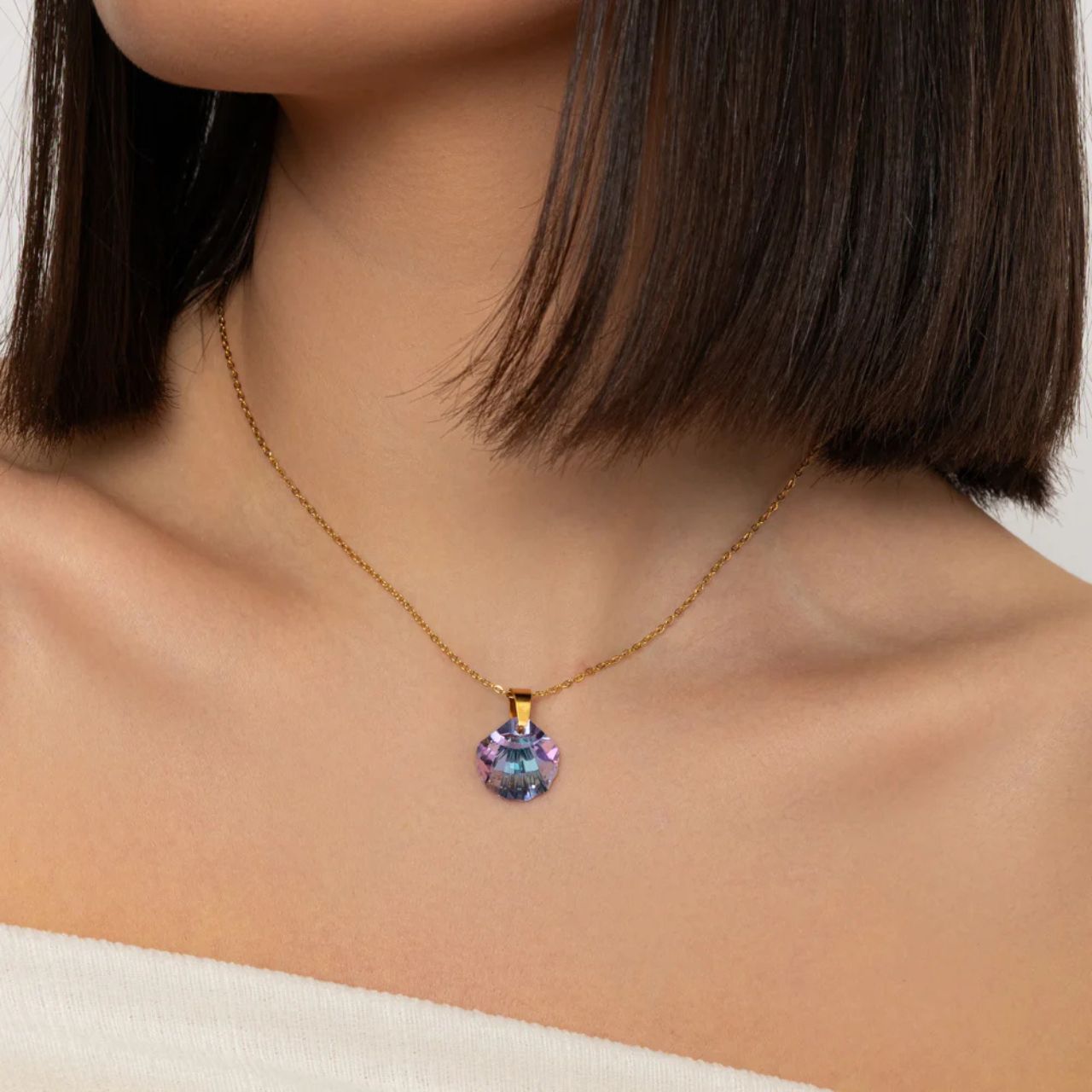 Beautiful amethyst rainbow crystal drop with fine gold plated chain.