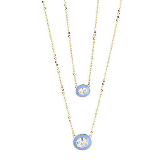 Featuring a stunning blue enamel and gold design, the Knight &amp; Day Blue Enamel Necklace is the perfect accessory for any occasion. With its sleek and sophisticated look, this necklace adds a touch of elegance to any outfit. Expertly crafted, it is sure to impress with its impeccable quality.
