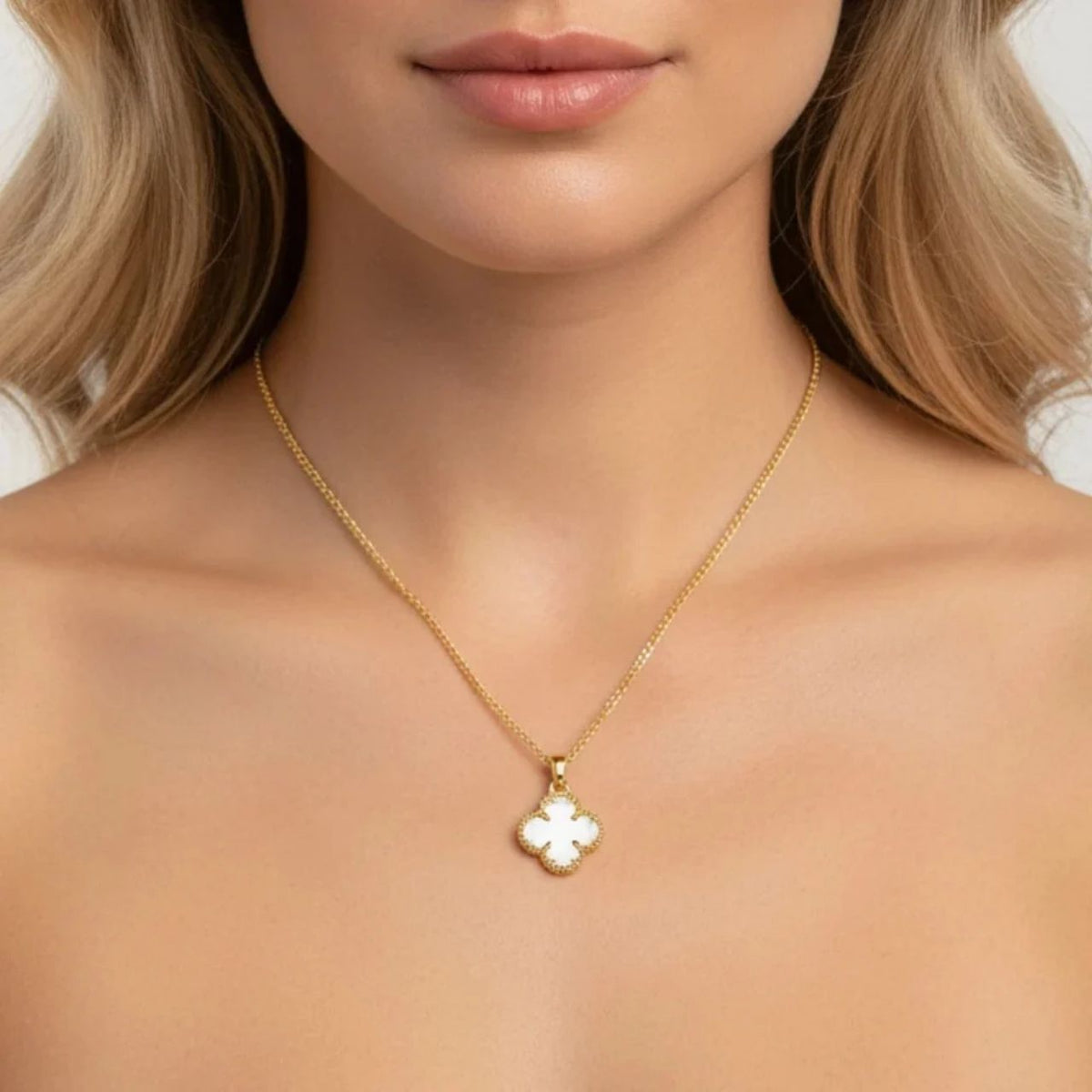 A timeless piece of elegance, this Knight & Day pendant features a sparkling clear crystal carved into a delicate clover shape, suspended in a warm gold-plated setting. The adjustable 40cm chain extends to 45cm, offering a perfect fit for any occasion. Ideal for layering or wearing solo, this versatile pendant brings a touch of sophistication to everyday style.