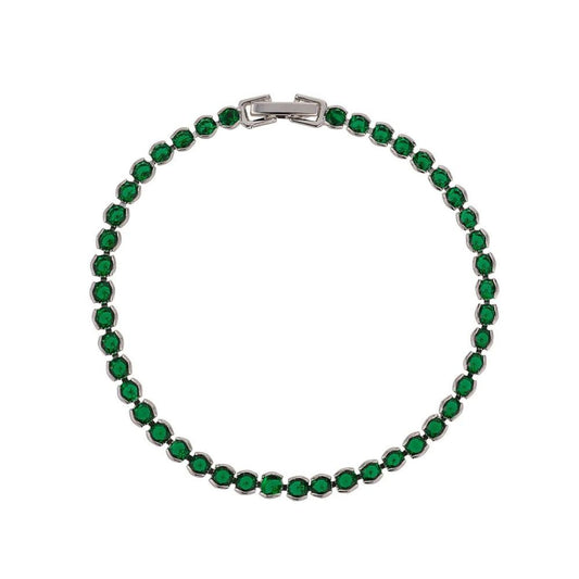 Dakota Emerald Tennis Bracelet by Knight & Day  Miniature rhodium plated tennis bracelet with Emerald CZ stones. Elegant when worn alone and also ideal for layering with watch or other bracelets. Fold over clip fastening.