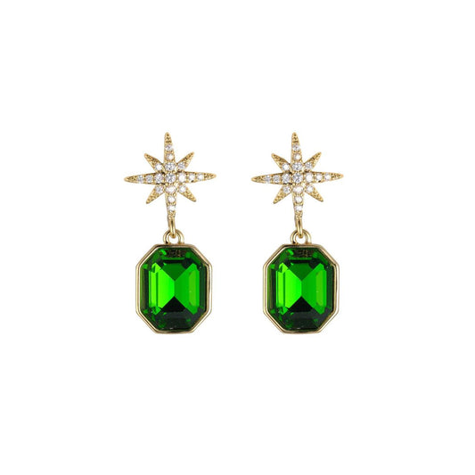 Experience the luxury of Knight & Day Emerald Crystal Star Earrings. Made with stunning emerald crystals, these earrings add a touch of elegance to any outfit. Perfect for formal events or everyday wear, these earrings are a must-have for any fashionista. Elevate your style with Knight & Day.