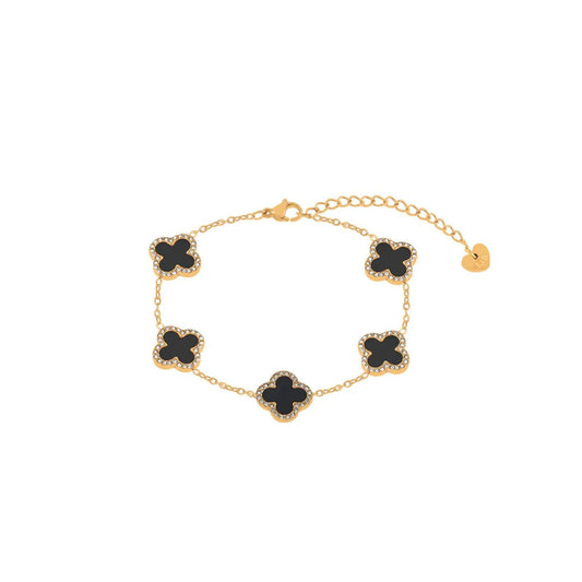 Five clover elements with black resin & crystal on fine gold plated chain. Lobster claw fastening.