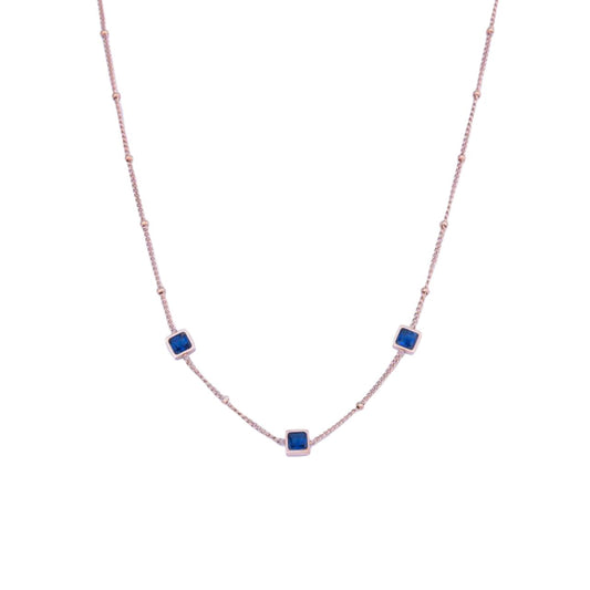 Leilani Sapphire Necklace by Knight & Day  Add an elegant touch to your ensemble with the classic beauty of the Knight & Day Leilani Sapphire Necklace. This timeless piece features a stunning and timeless combination of a rose gold chain and a single sapphire pendant. Add instant sophistication to any outfit with this stunning showpiece.