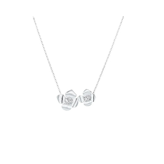 Delicate and effortlessly elegant, the Madelyn Necklace features two pretty floral shapes in brushed silver plating, beautifully embellished with sparkling CZ stones. Its fine, feminine design makes it a lovely choice for adding a subtle touch of elegance to any outfit.