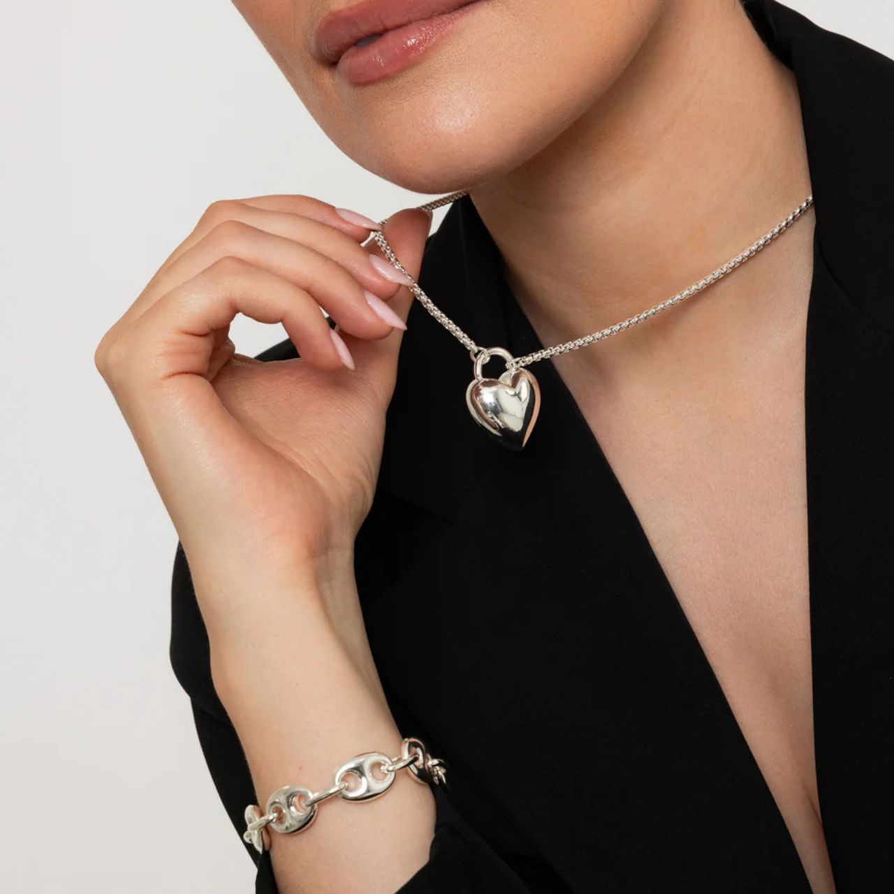 Chunky style bracelet in contemporary design. Silver plating.