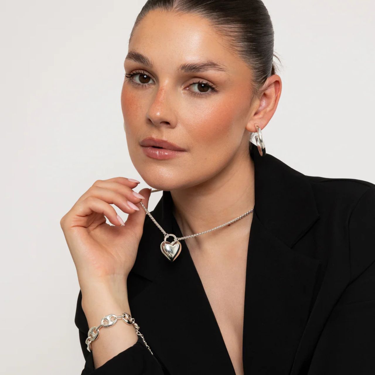 Chunky style bracelet in contemporary design. Silver plating.