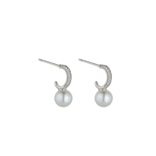 These elegant Nalani Silver Plated Pearl Earrings by Knight & Day are a perfect addition to any outfit. With their silver plated finish and stunning pearl detailing, they add a touch of sophistication and beauty to any look. Elevate your style with these timeless earrings.