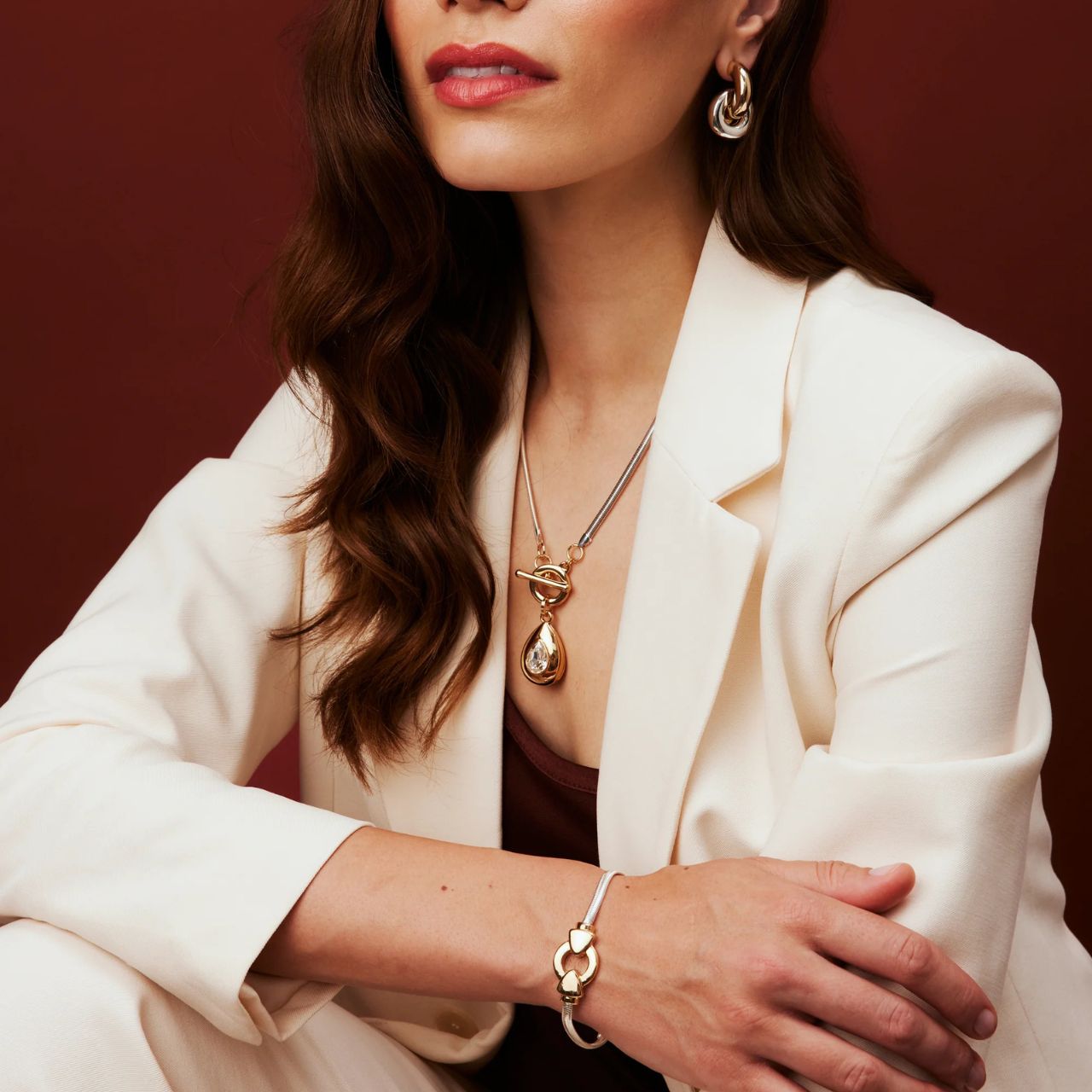 Beautiful flat snake chain with silver plating & gold tone centre piece.