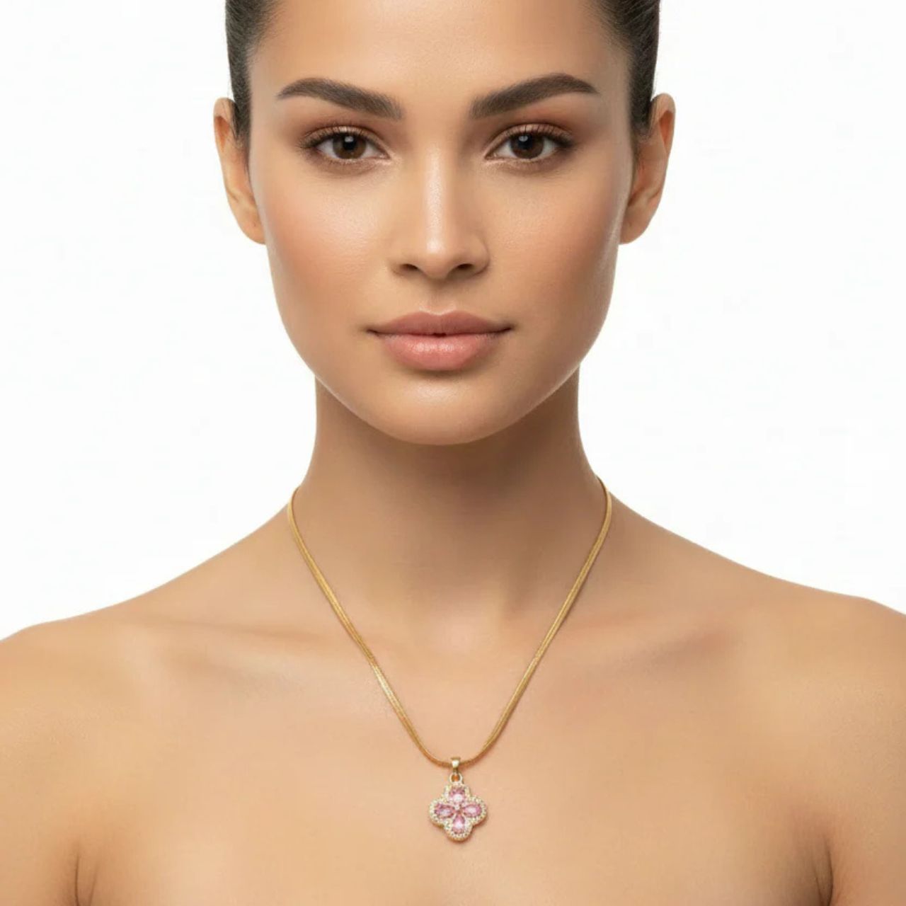 A charming clover pendant that captures the essence of Irish luck and elegance. Each of the four leaves features a soft pink crystal, beautifully framed with sparkling clear crystal detailing for added sophistication.