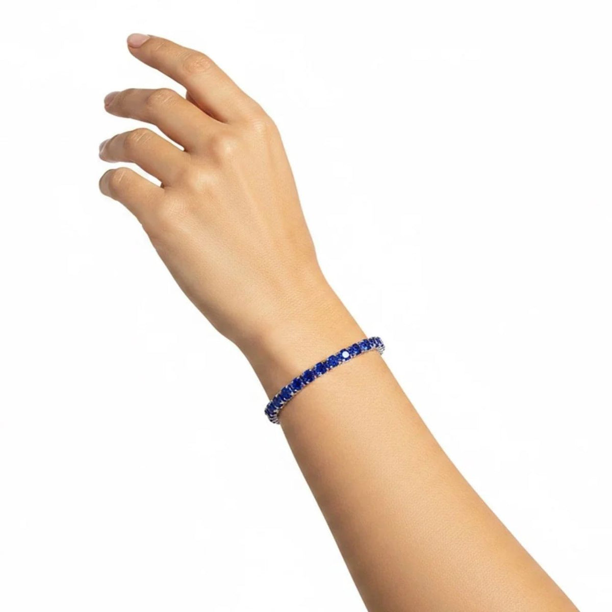 Beautiful tennis bracelet featuring 4mm sapphire cubic zirconia stones set in rhodium-plated silver. The secure fold-over clasp ensures a comfortable, reliable fit for everyday wear or special occasions. A timeless piece that catches the light with elegant sparkle.
