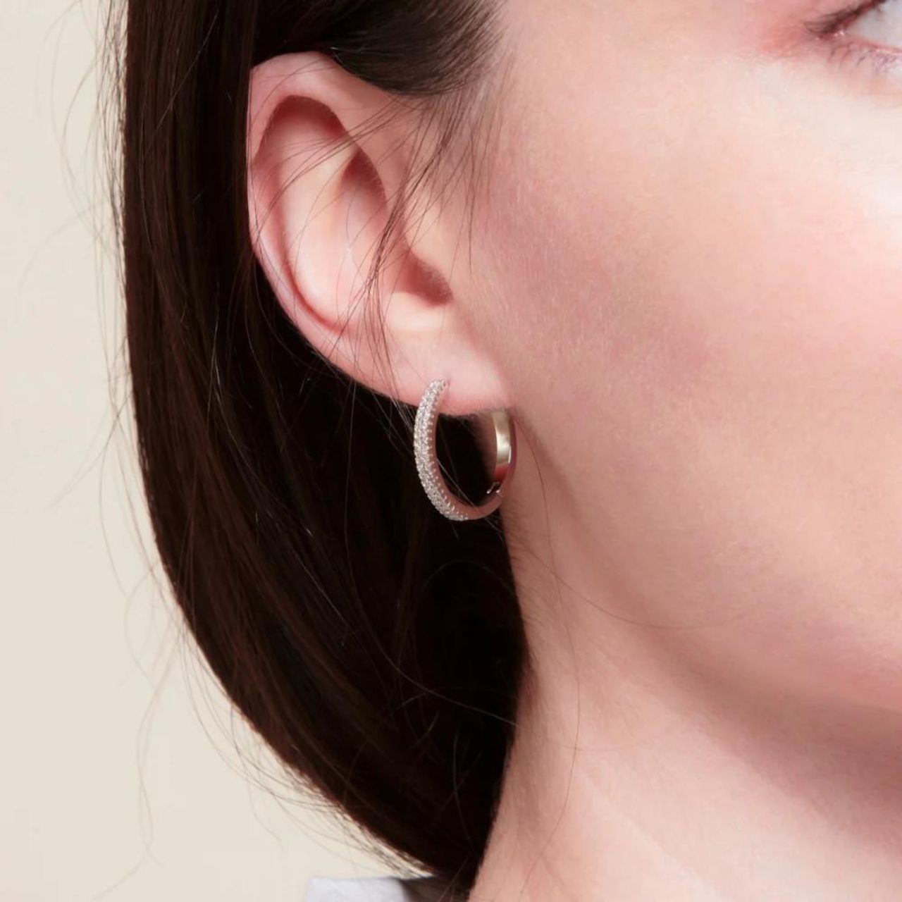 Savannah Rhodium Hoop Earrings by Knight & Day  Beautiful hoops (18mm) embellished with clear CZ stones in micro pave setting. Rhodium plating.