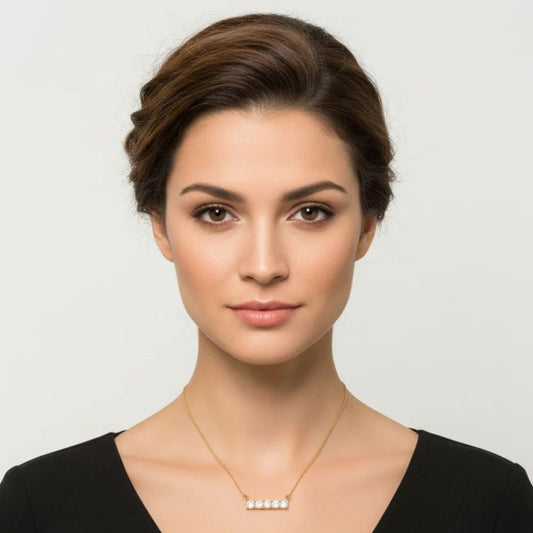 Beautiful crystal bar encrusted with 5 CZ stones. Length 16" + 2" extension. 18k gold plated.