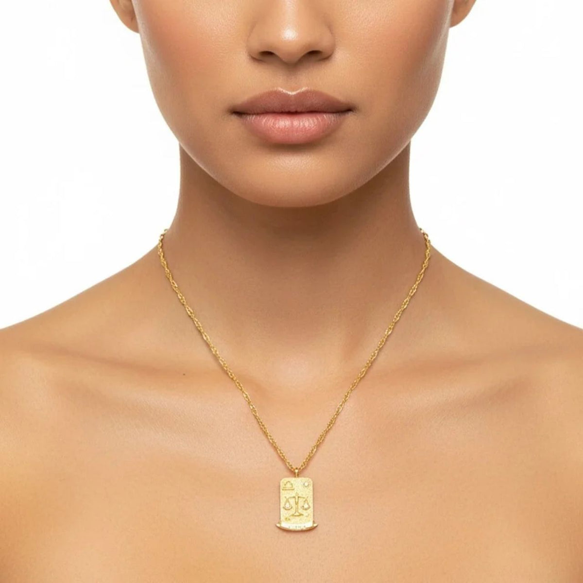 Libra Zodiac Pendant – 18K Gold Plated. Celebrate the graceful, sociable and harmonious spirit of Libra, born between September 23rd and October 22nd, with this elegant zodiac pendant.