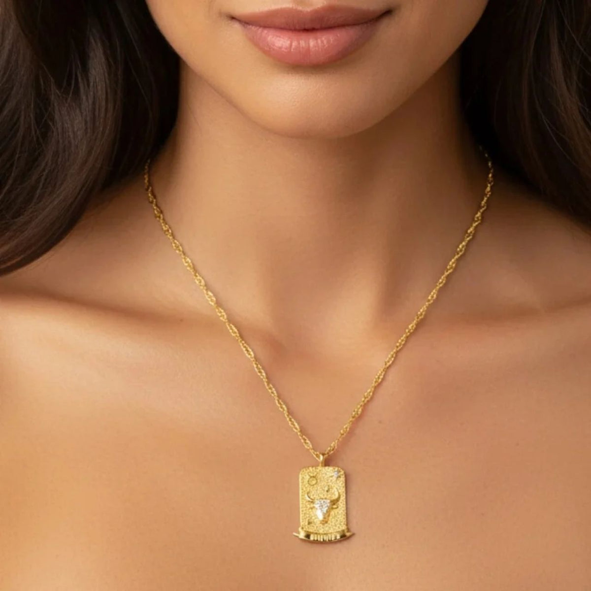 Taurus Zodiac Pendant – 18K Gold Plated. Celebrate the calm, grounded and dependable spirit of Taurus, born between April 20th and May 20th, with this elegant zodiac pendant.
