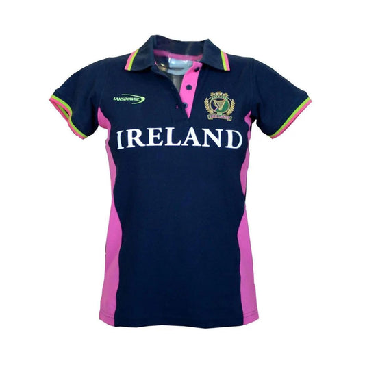 This premium ladies navy Ireland polo shirt showcases a bold pink color on the collar and sides, adding a touch of femininity to its sporty design. It also features the Irish harp and the Lansdowne logo.