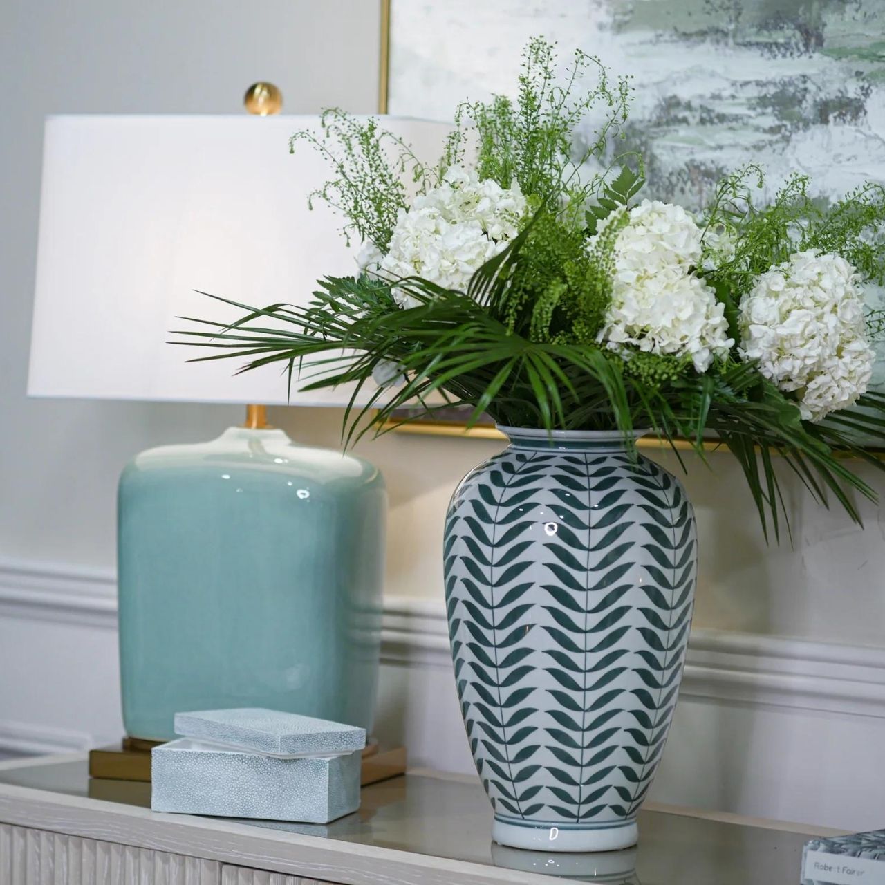 Leaf Vase by Mindy Brownes  This gorgeous ceramic decorative vase will add a delicate pop of colour to your home. The calming colour pallet with it's off white base and green leaf pattern will make this the perfect spring home accessory.