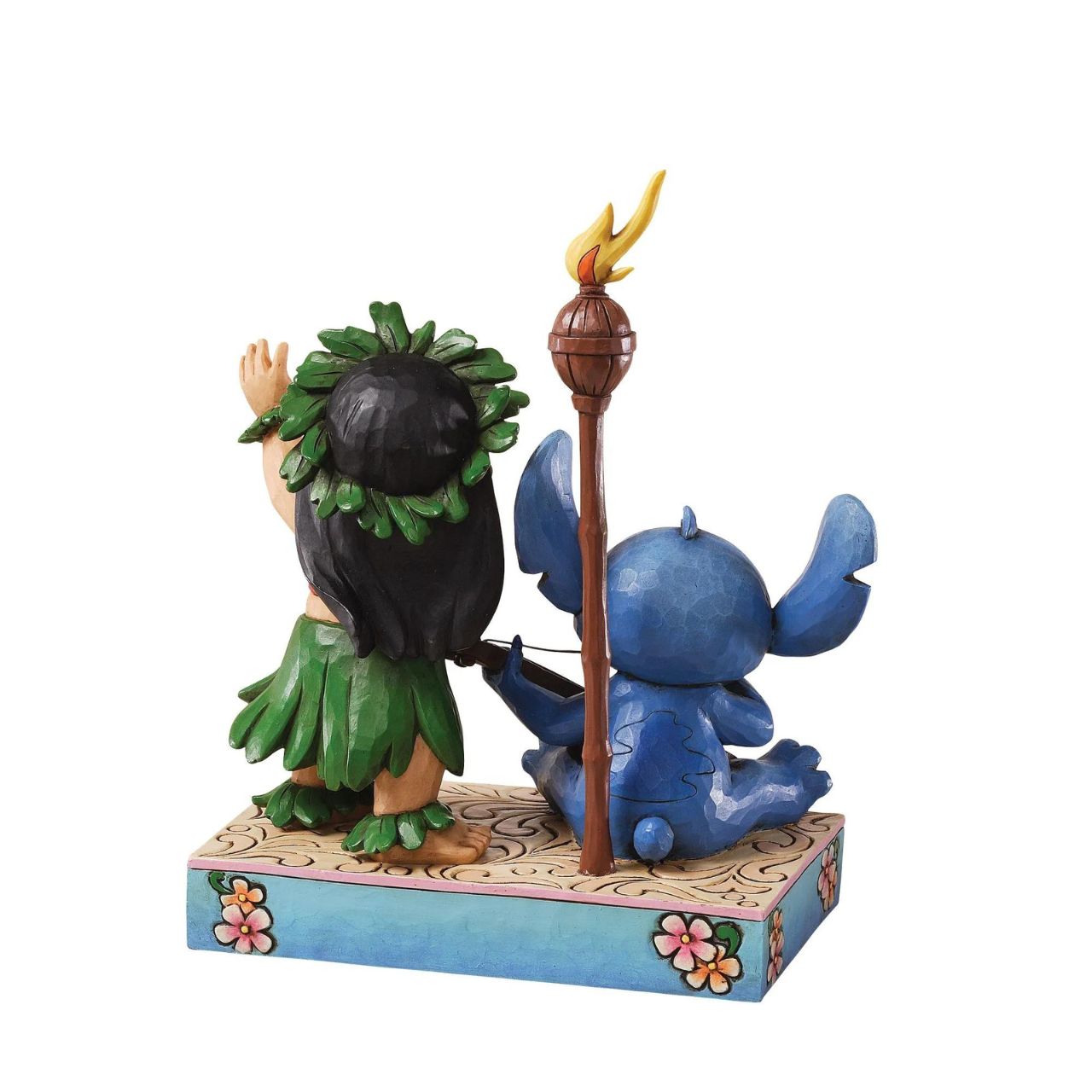 Disney Lilo and Stitch Figurine by Jim Shore  Inspired by the ending sequence of Disney's Lilo and Stitch, Jim Shore creates a beautiful memento to Ohana or Family. Stitch picks at his hawaiin guitar while lilo dances her native luau.