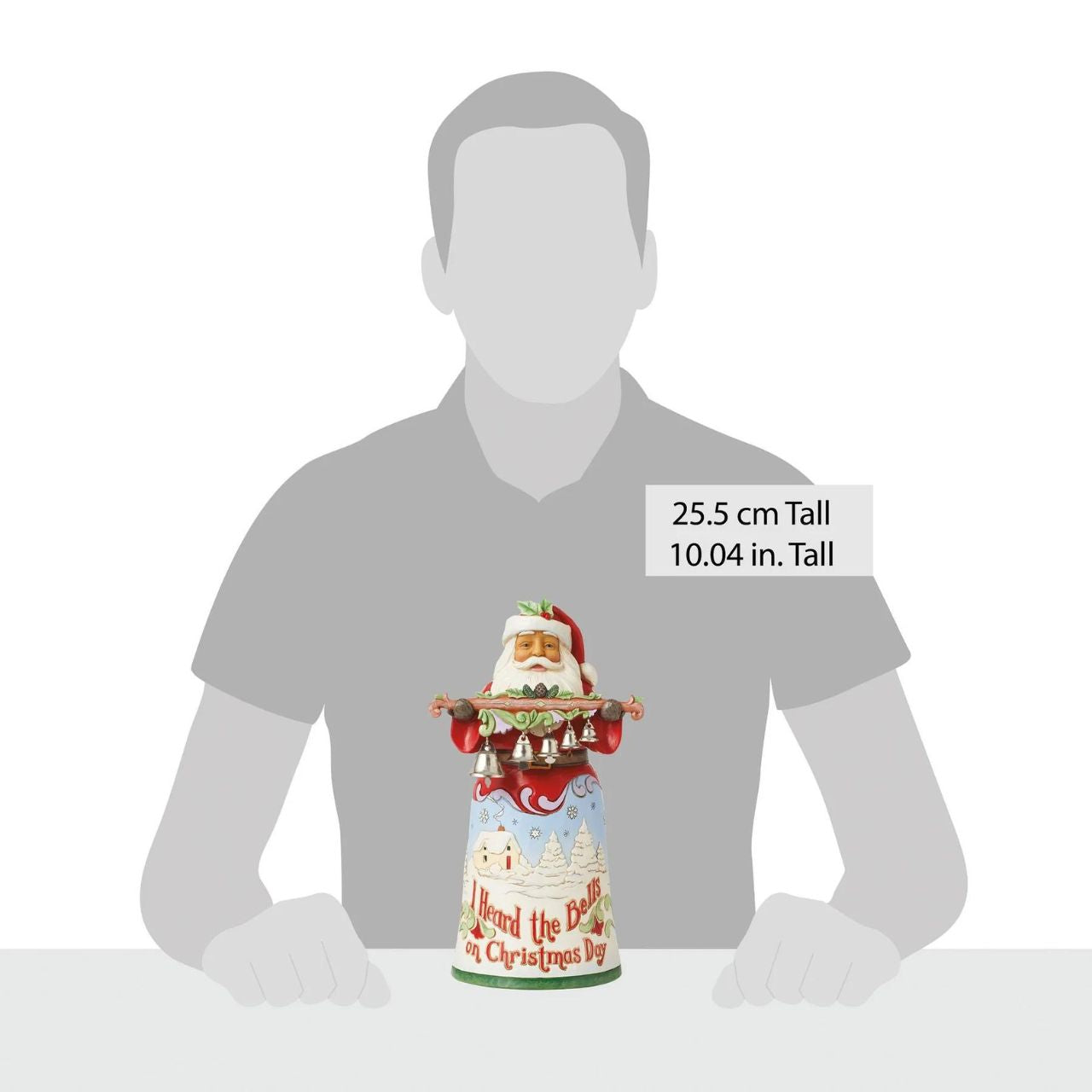 The 18th annual limited edition Song Santa from Jim Shore as part of his Heartwood Creek collection. Featuring hand painted illustrations across Santa's skirt, showing scenes from the iconic song, I Heard The Bells On Christmas Day.
