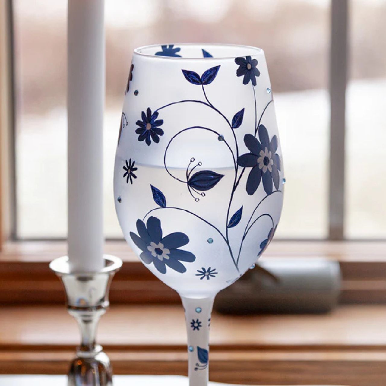 This gorgeous Chinoiserie cup from Lolita Designs features hand-painted flowers on frosted glass. With inlaid crystal details, this beautiful blue wine glass honors the exotic and luxurious style of beloved 19th century Chinoiserie decor.