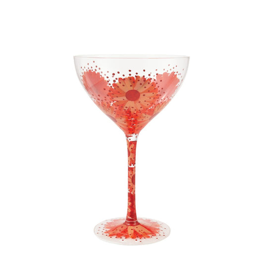 Celebrate Lolita's anniversary with our Negroni Cocktail Glass. A beautiful reminder of how Lolita first started Designs by Lolita with this design. This particular fun design is surrounded speckles or pinks and oranges with florals around the rim to the base, the perfect glass for spring/summer.