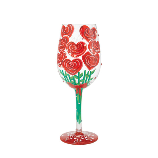 Elevate a romantic evening with this unique wine glass from Lolita showcasing a stunning bouquet of hand-painted red roses crafted into the shape of hearts.