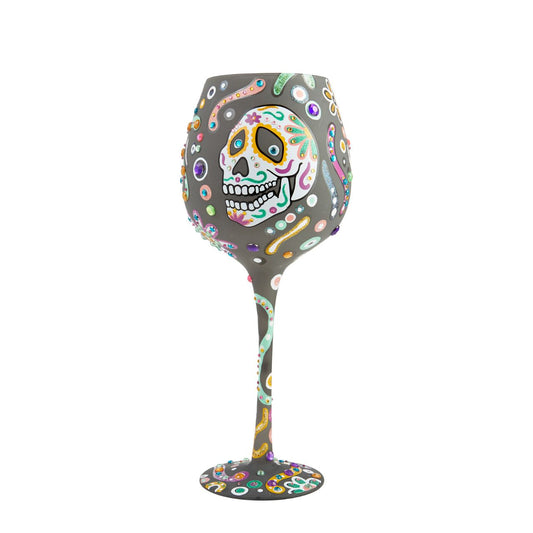 The Sugar Skull is used as a symbol of celebration to honour the lost. Toast to those gone with this spooktacular superbling wine glass. Guaranteed to fill your Halloween night's festivities with just the right combination of spellbinding and spooky. Hand wash only. Securely packaged in a beautiful, decorative gift box.