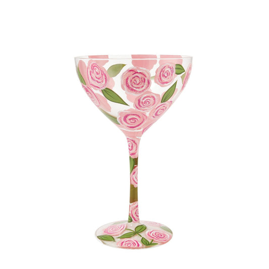Celebrate Lolita's anniversary with our Vodka Rose Punch Cocktail Glass. A beautiful reminder of how Lolita first started Designs by Lolita. This particular beautiful floral design has pink roses surrounding the whole glass with green leaves. A beautiful design perfect for spring/summer. Try Lolita's Vodka Rose Punch cocktail on the base of the glass.