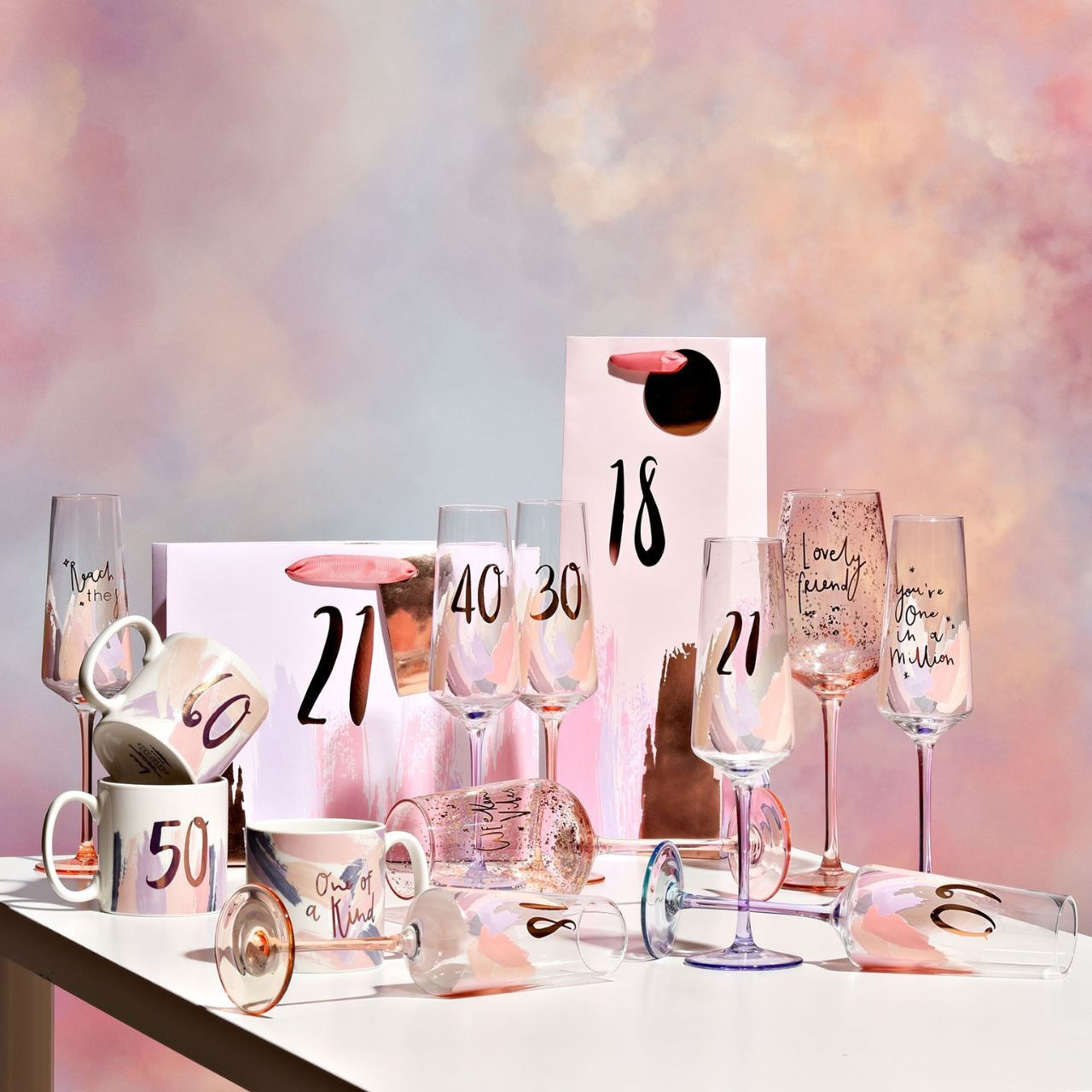 Celebrate special moments in style with the Luxe Brushstroke Birthday Flute 21 from Hotchpotch by CELEBRATIONS. Crafted from glass with a lustrous shiny finish, this birthday flute adds a touch of sophistication.