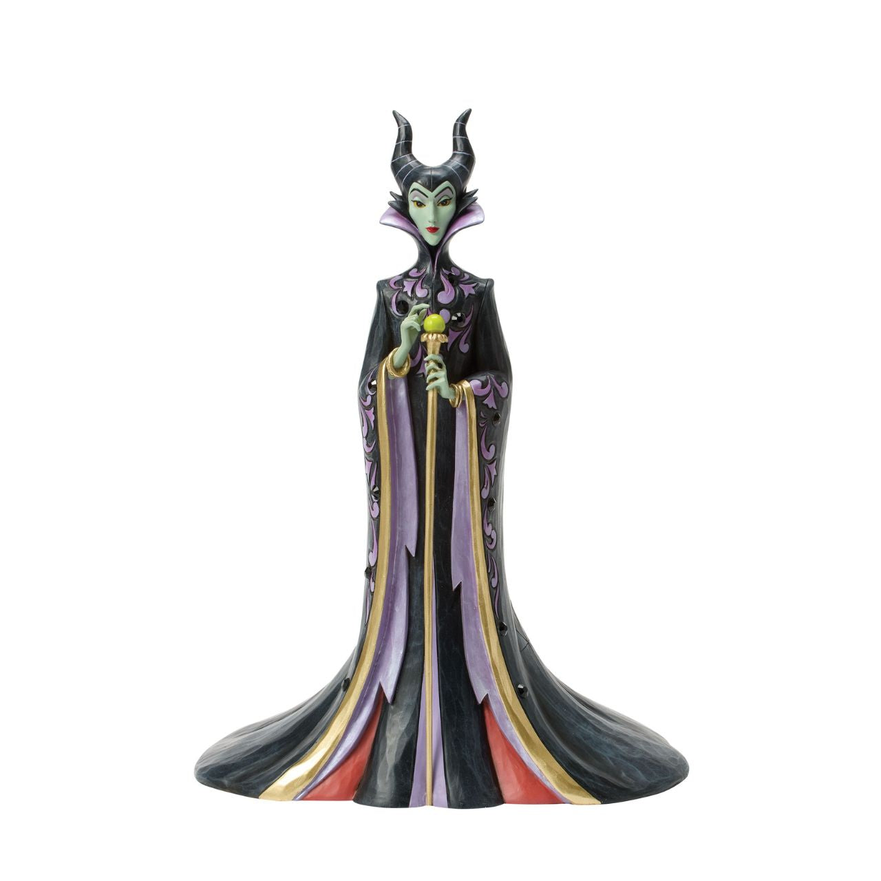 This Jim Shore design captures the vengeful villainess, Maleficent, in her striking black and purple cloak adorned with Shore's quilt and rosemaling patterns. With a sinister gaze, she taps her staff, channeling dark magic with malice in her heart.