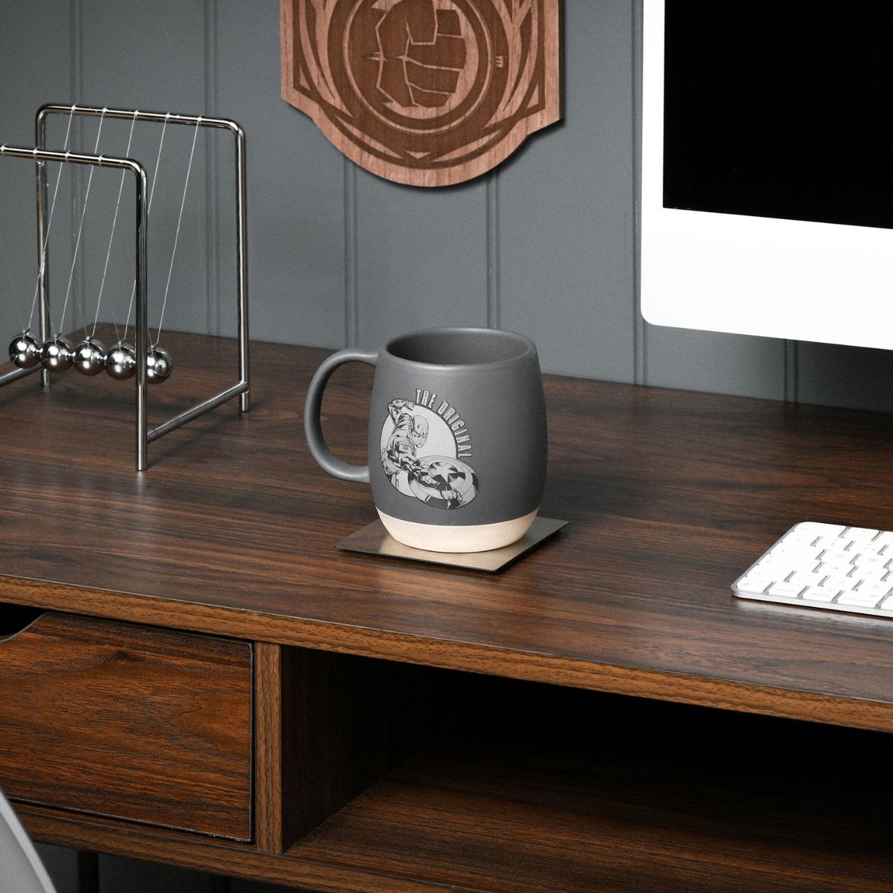 Indulge in your morning brew with the Avengers Captain America Mug, a ceramic dream for any Marvel fanatic. Its striking Avengers logo, embossed on a cool grey backdrop, captures the essence of Captain America's charm.