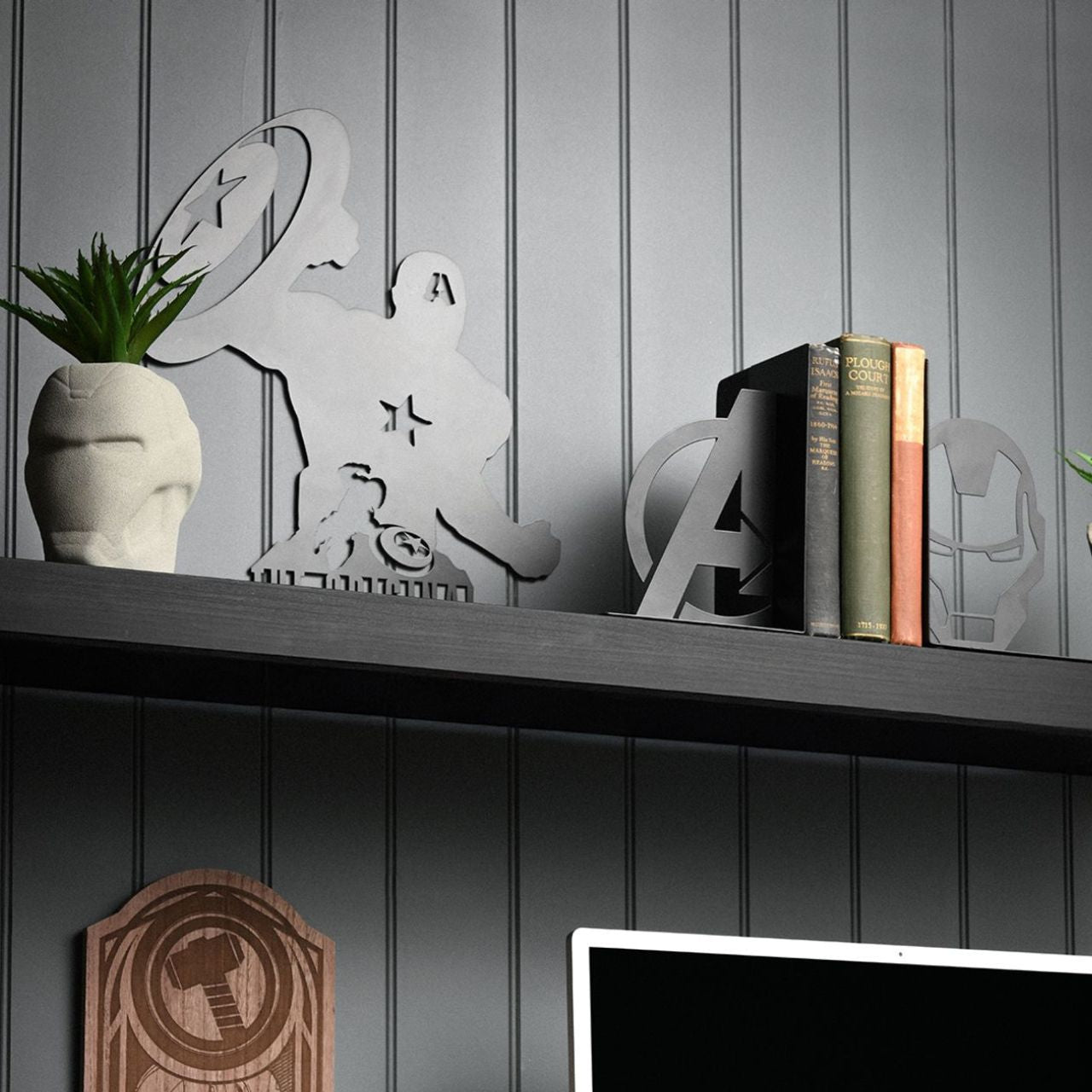 Summon the power of the Marvel universe to your bookshelf with our Avengers Iron Man Metal Bookends. These eye-catching bookends, featuring striking silhouettes of the iconic Avengers logo and Iron Man helmet, are a must-have for any Marvel fan.
