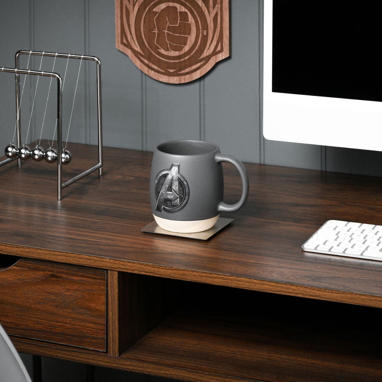 Unleash your inner superhero with the Marvel The Avengers Mug. This striking gray ceramic mug, featuring an embossed Avengers logo, is a must-have for any Marvel enthusiast. Perfect for sipping your morning brew, it's a delightful way to add a touch of fandom to your day.