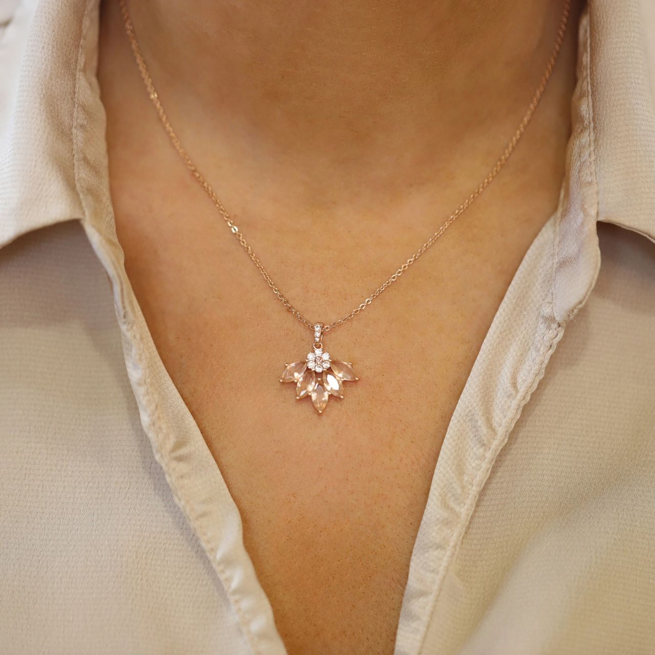 This magnificent pendant is the perfect accompaniment to any dresswear. It suspends from a delicate cable chain which secures safely with an adjustable lobster claw clasp.