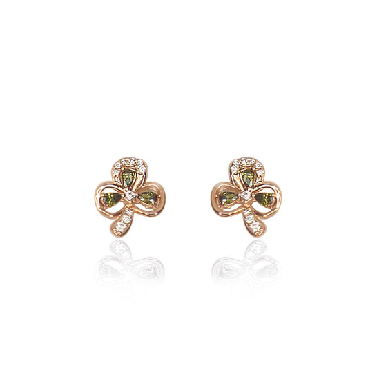 Charming and iconic, these shamrock earrings feature three looping open shamrock leaves lined with sparkling clear crystals. Each leaf is set with an emerald green pear shaped stone cut to enhance its colour and shine. Polished to a bright shine, these post earrings secure comfortably with push backs.