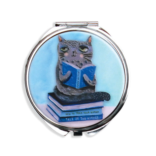 Michelle Allen Cat and Books Trinket Box  This lightweight and durable Cat and Books trinket box makes a splendid gift for a friend or yourself. They are the perfect size to fit in any purse, make-up bag, carry on, or backpack. And best of all, they are super practical for every day use.