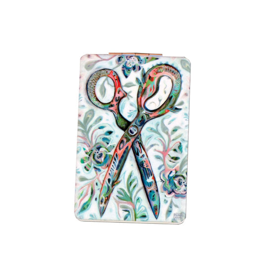 Michelle Allen Scissors Compact Compact Mirror  This lightweight and durable scissors compact mirror makes a splendid gift for a friend or yourself. They are the perfect size to fit in any purse, make-up bag, carry on, or backpack.