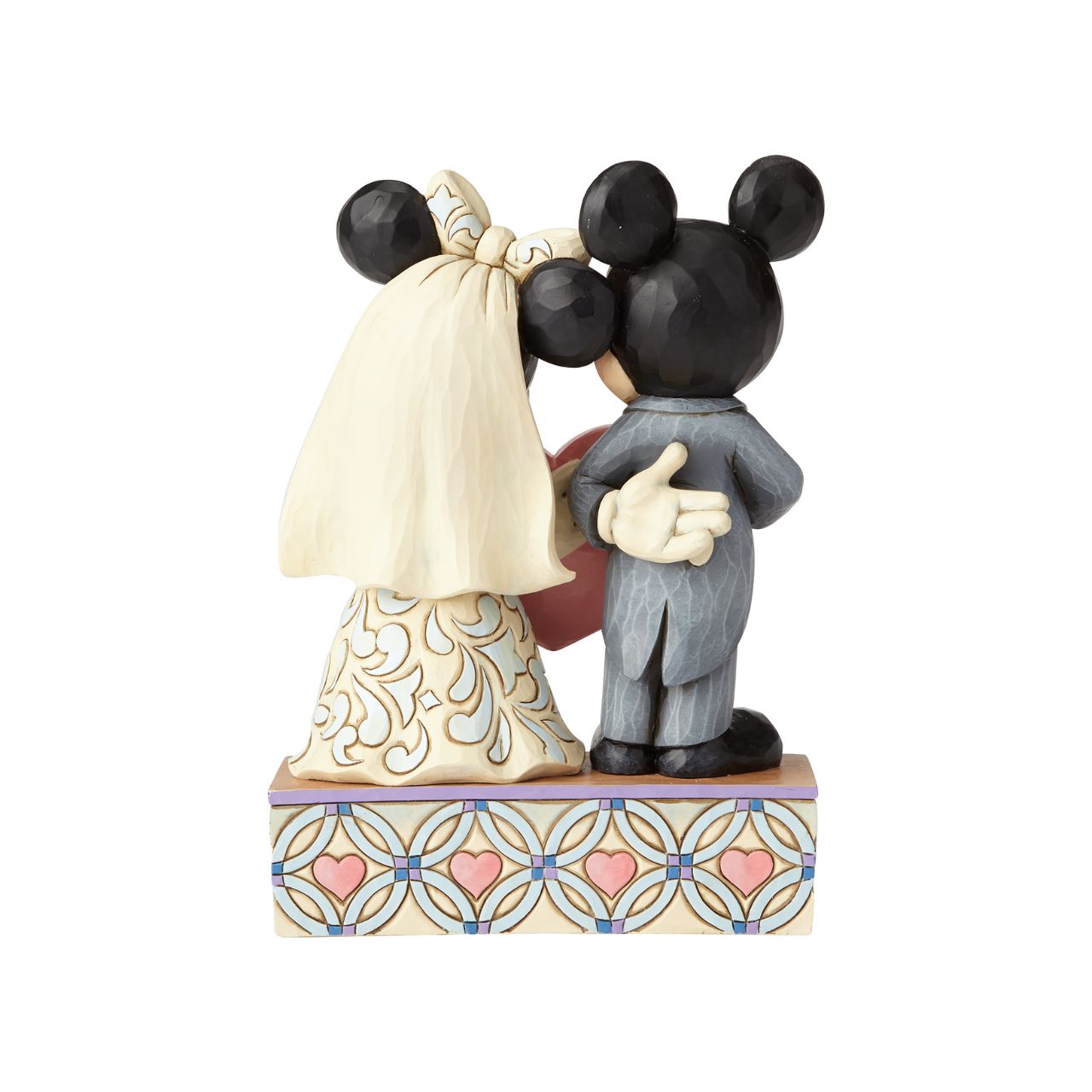 Disney Mickey Mouse and Minnie Mouse Figurine Two Souls, One Heart  This beautifully detailed figurine is a gorgeous depiction of Mickey as a doting groom with quilted accents on his suit and Minnie as a blushing bride in a gown with rosemaling details.