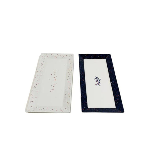 Midnight Blue Christmas Platter Set of 2 by Mindy Brownes  Introducing our set of two Christmas platters. Rectangular in design these plates have a simple yet festive pattern and curved rim for stylish serving of cakes, cookies, and more.