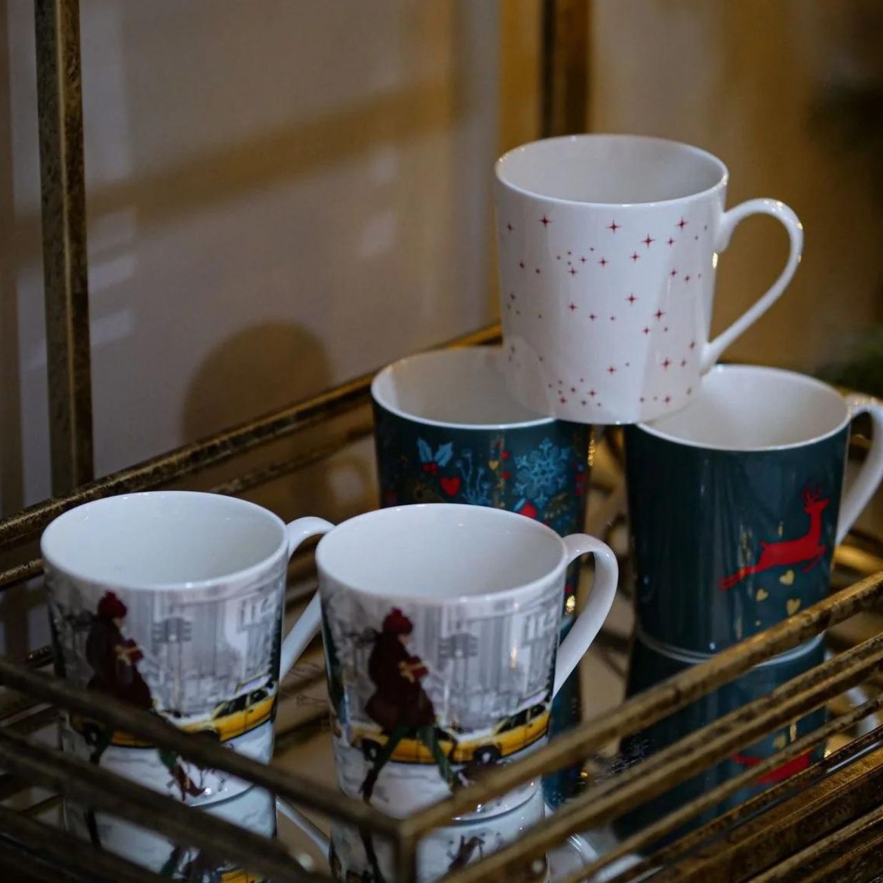 Mindy Brownes A Christmas Wish Mugs Set of 6  Introducing our set of 6 Christmas Cup. These beautifully crafted and designed Christmas cups are an ideal choice for tea, coffee or a hot chocolate curled up beside the fire on a cold winters evening.
