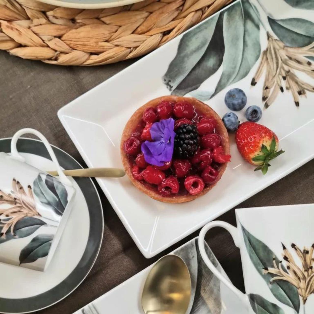 Birds of Paradise Platters Set of 2 by Mindy Brownes  Rectangular in design these plates have a floral pattern and curved rim for stylish serving of cakes, cookies, and more.