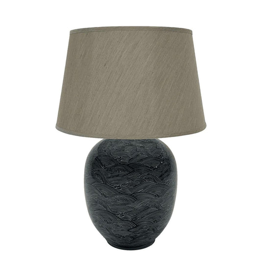 Blue Waves Lamp by Mindy Brownes  Mindy Brownes Ceramic Lamp. Good lighting is essential for every home. Our ceramic collection is traditional yet timeless and featuring stunning designs, prints and patterns bursting with colour. This lamp features blue and navy wave details with a taupe linen shade.