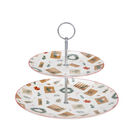 Christmas Spirit Two Tier Cake Stand by Mindy Brownes  Introducing our enchanting Christmas spirit collection. Designed to add a touch of festive elegance to your festive gatherings. This beautiful collection is adorned with exquisite Christmas motifs such as wrapped Christmas gifts, wreaths, and winter florals.