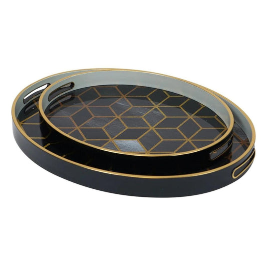 Mindy Brownes Geometric Trays Set of 2  A stunning set of two oval trays in midnight blue, with a gold rim and modern geometric prints.