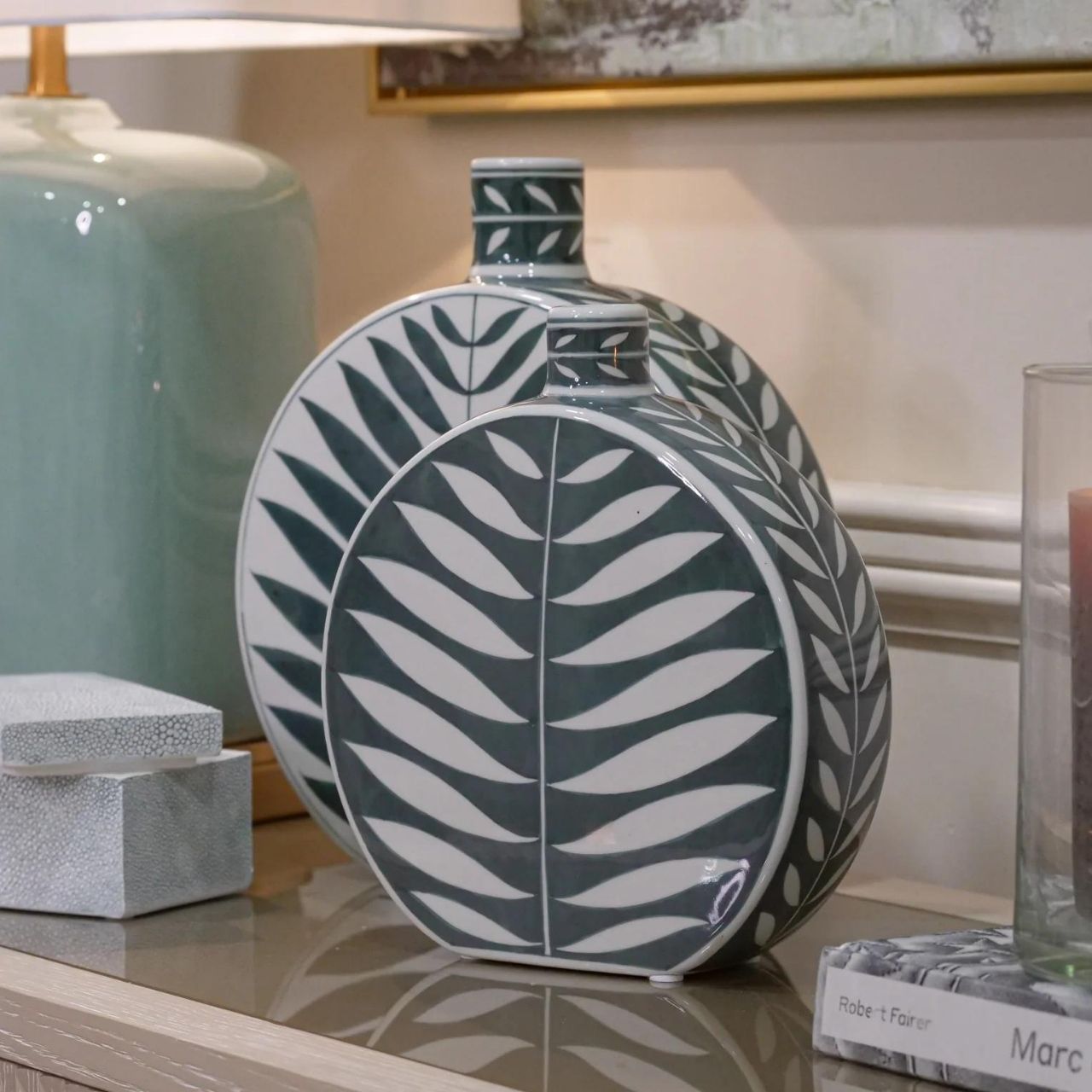Leaf Bottle Small by Mindy Brownes  This gorgeous ceramic decorative bottle will add a delicate pop of colour to your home. The calming colour pallet with it's green base and white leaf pattern will make this the perfect spring home accessory.