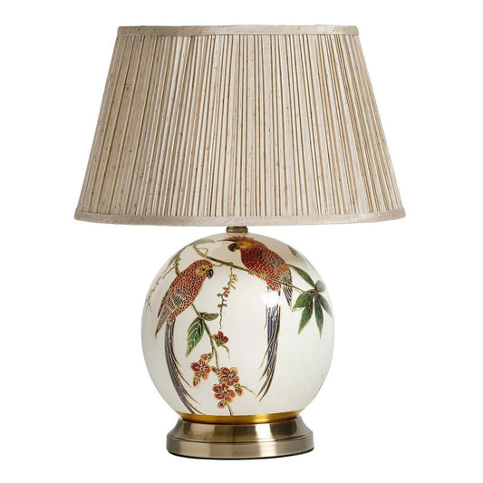 Megan Lamp by Mindy Brownes  Tropical décor inspired lamp with parrot illustration. Finished with a pleated champagne in colour silk shade.