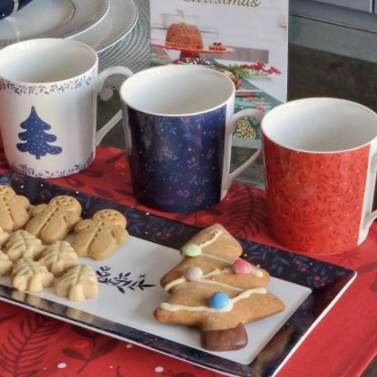 Midnight Blue Christmas Platter Set of 2 by Mindy Brownes  Introducing our set of two Christmas platters. Rectangular in design these plates have a simple yet festive pattern and curved rim for stylish serving of cakes, cookies, and more.