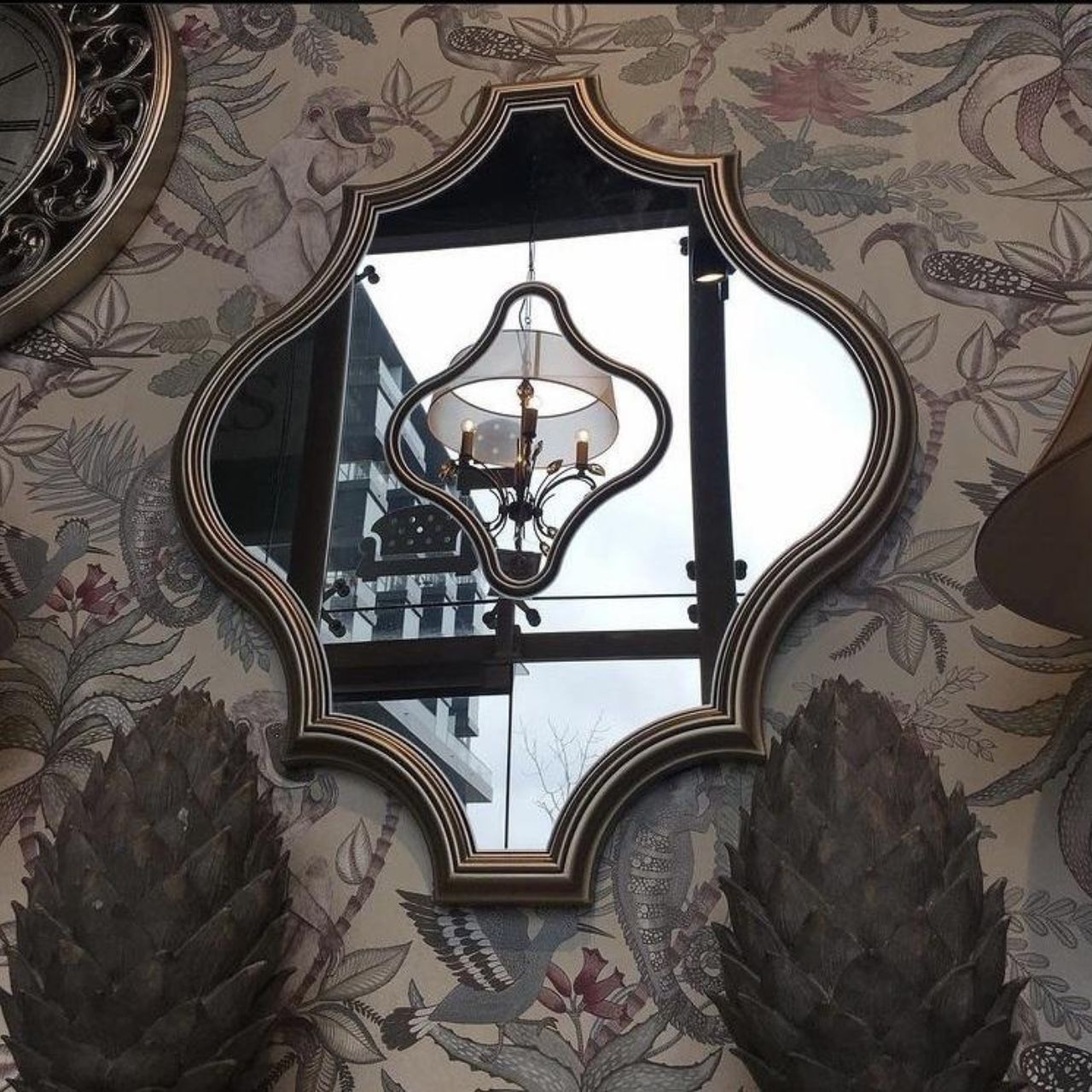 Mindy Brownes Racheal Mirror  Ogee shaped wall art mirror. This style of mirror is ideal hung in two's or threes, makes for a fabulous statement piece. Gold in colour.
