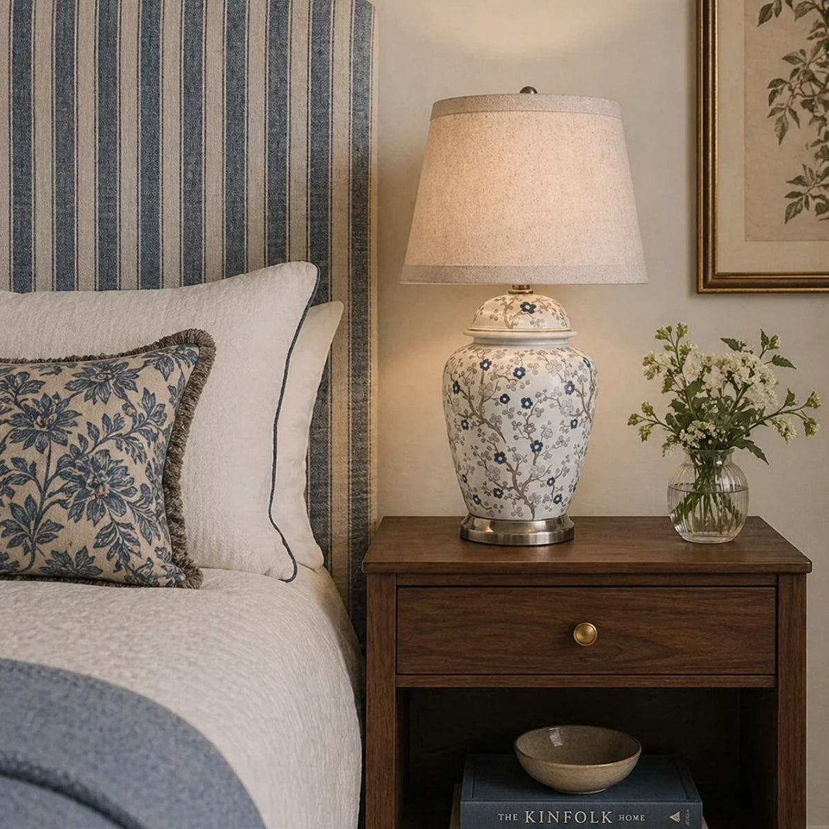 The Siya Lamp combines elegant floral design with functional lighting. Its beige shade perfectly complements the blue flower detailing, creating a stunning addition to any room. With a charming aesthetic and soft lighting, this lamp will enhance the ambiance and style of your home.