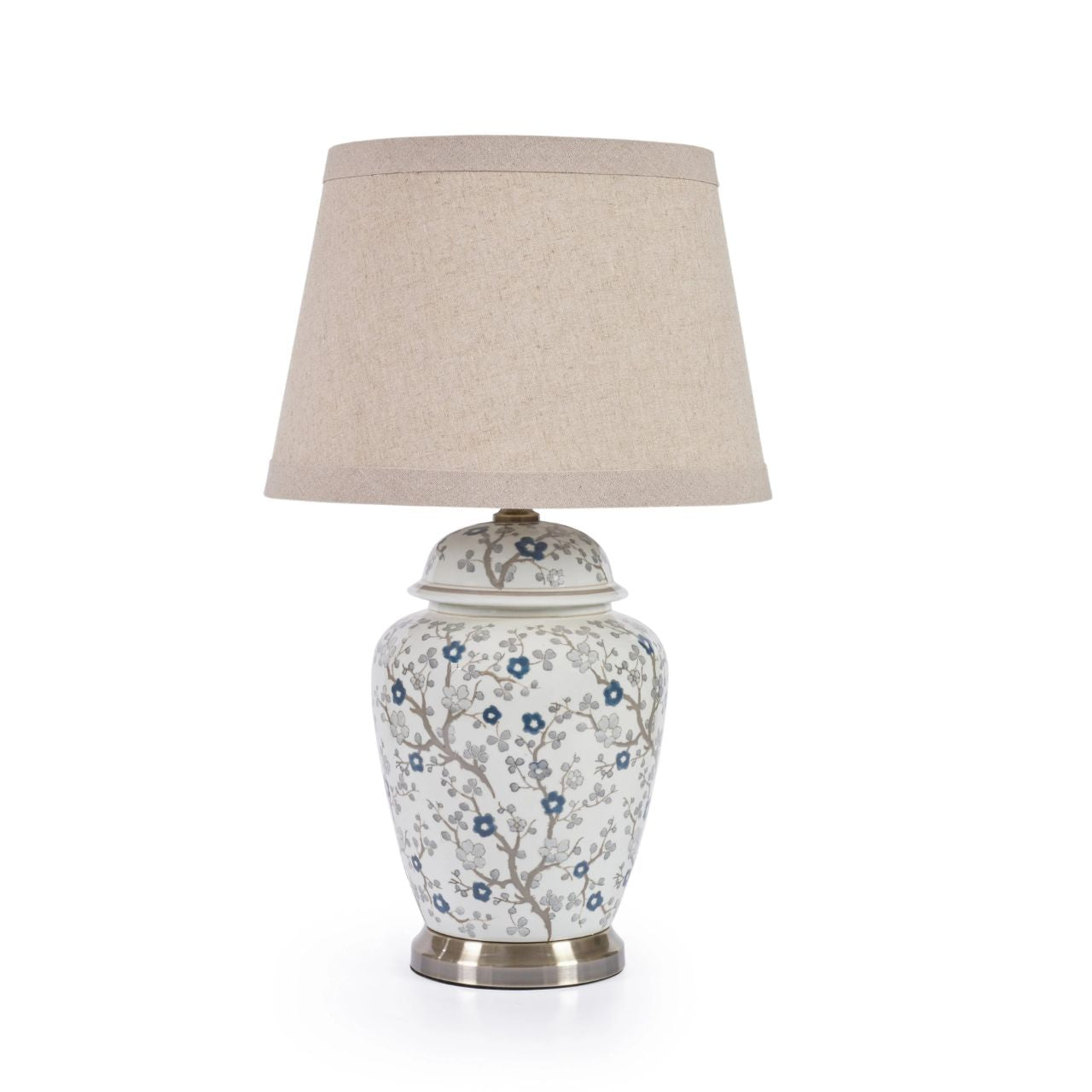 The Siya Lamp combines elegant floral design with functional lighting. Its beige shade perfectly complements the blue flower detailing, creating a stunning addition to any room. With a charming aesthetic and soft lighting, this lamp will enhance the ambiance and style of your home.